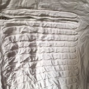 white shirt with zip across